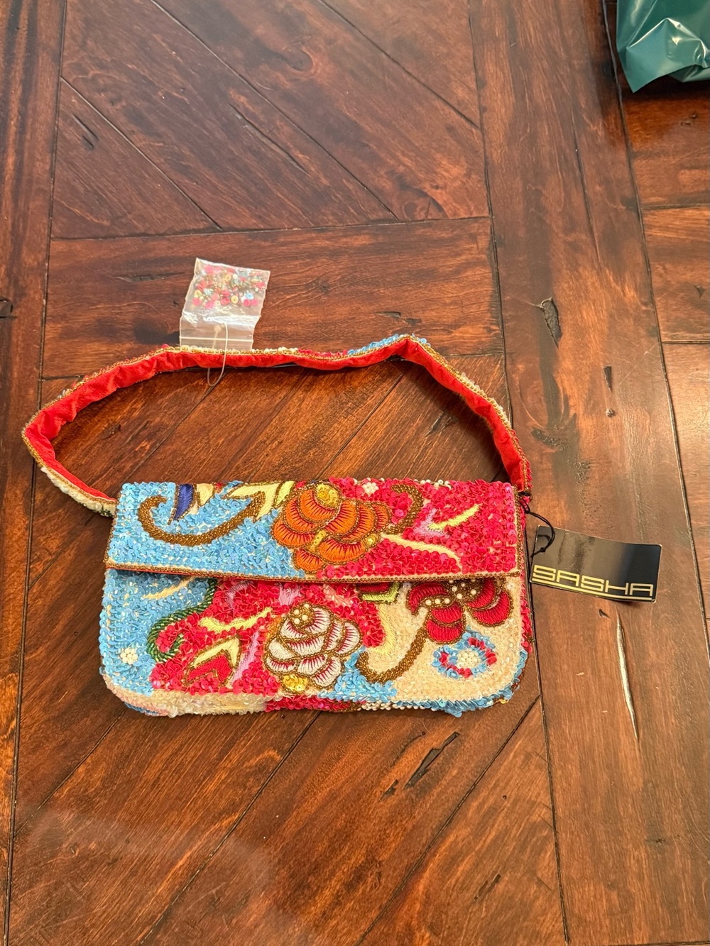 Sasha Multicolor Beaded Floral Wristlet Clutch in Red & Blue